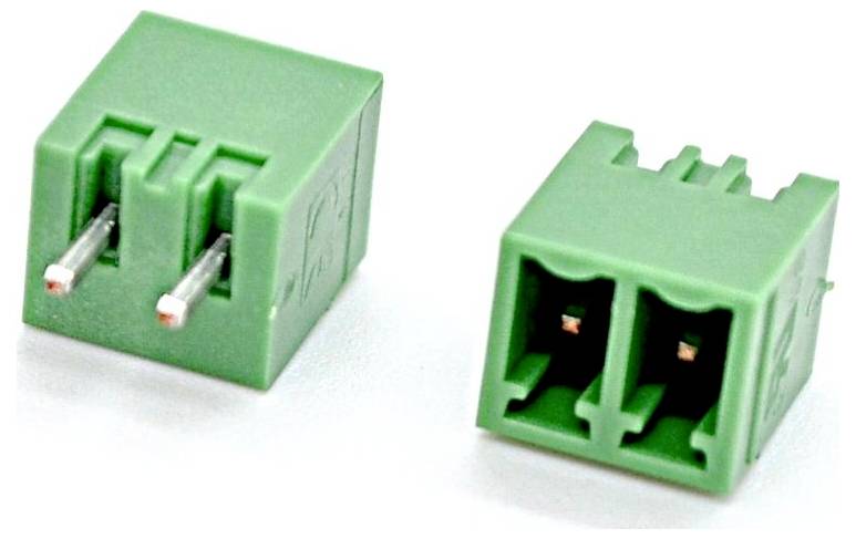 Two green 2-pin electrical terminal plug connectors shown on a white background, one with exposed metal pins and one with socket openings.