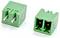 Two green 2-pin electrical terminal plug connectors shown on a white background, one with exposed metal pins and one with socket openings.