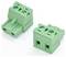 Two green two-pin screw terminal connectors on a white background.