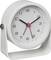 White analog alarm clock showing about 10:10, with black hour and minute hands and a red second hand in a minimalist stand.