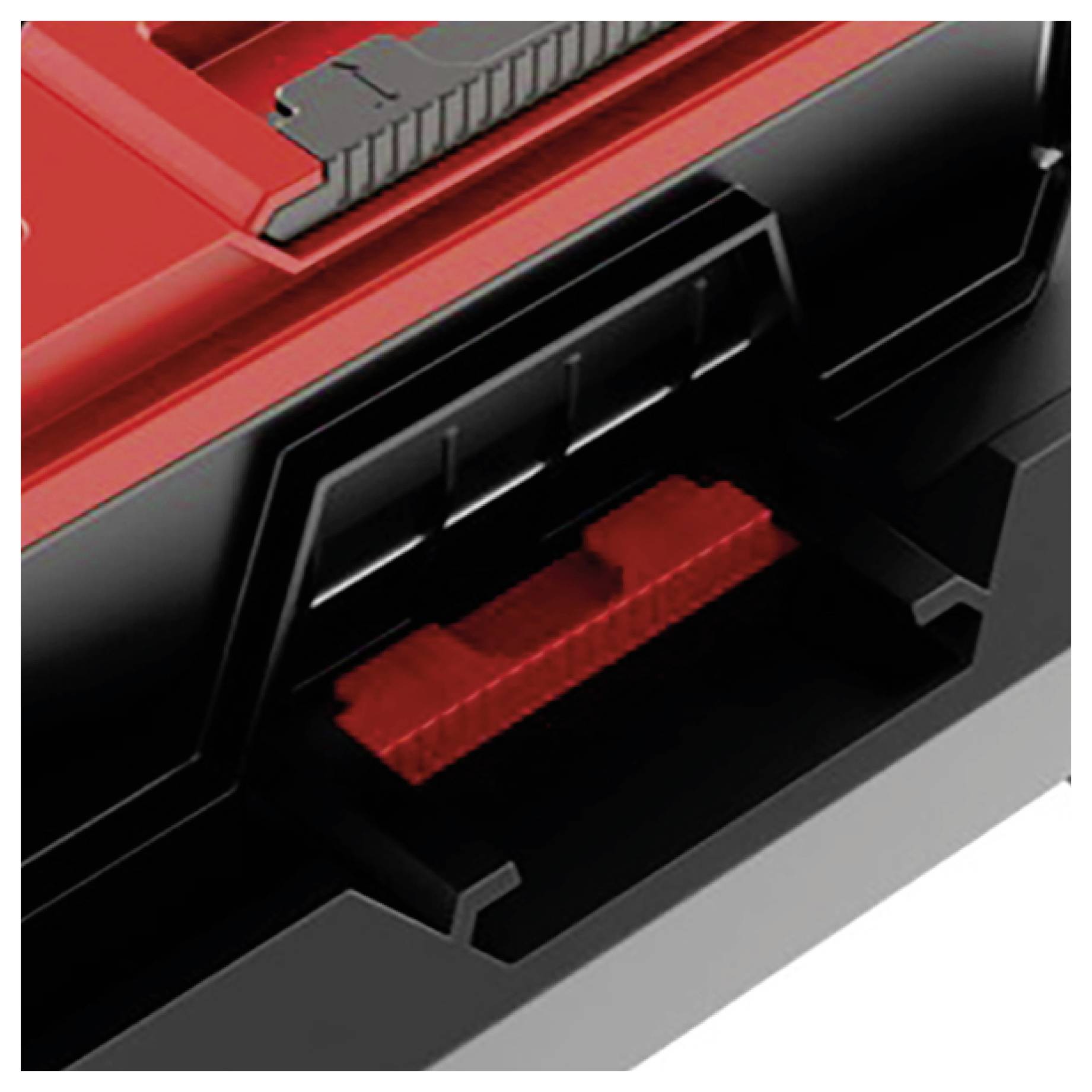 Close-up of a red-and-black device housing with a rectangular opening and a red internal component or connector visible inside.