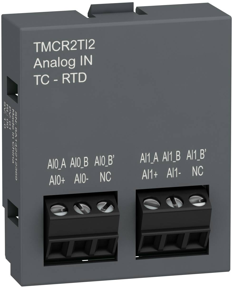 Gray industrial input module labeled 'TMCR2TI2 Analog IN TC - RTD' with two screw terminal blocks for analog sensor connections.
