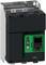 Schneider Electric industrial motor starter or drive unit with black and green housing, terminal labels, and a front display panel<br>