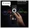 Hand holding a Google TV voice remote with 'Hey Google' prompt and 'Just Ask Google' text, promoting voice control for search and playback.