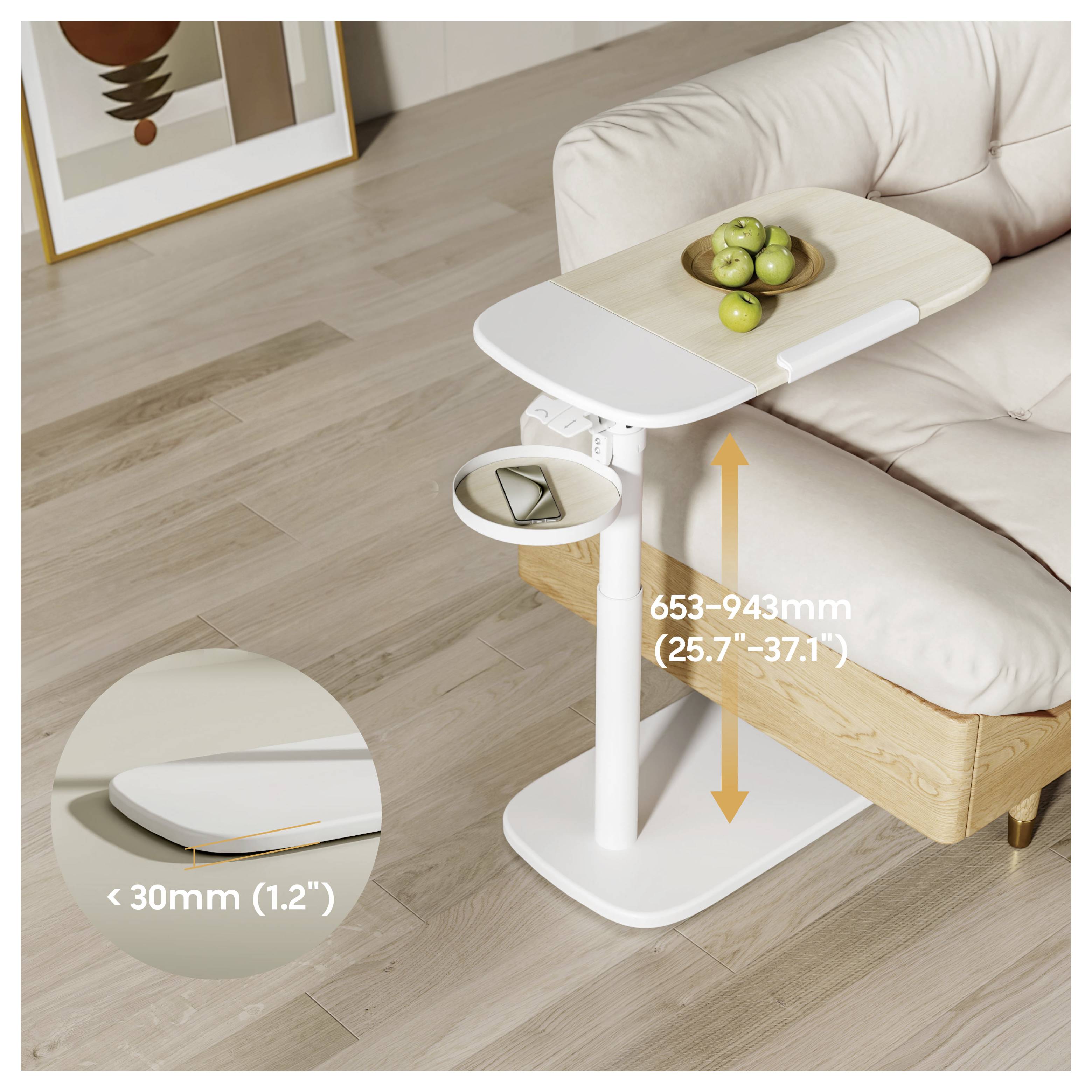 Adjustable sofa side table beside a couch, showing height range 653-943 mm and base thickness under 30 mm.<br>