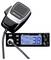 Midland CB radio with handheld microphone, blue digital display showing channel 38 and FM mode, with volume and squelch controls.<br>