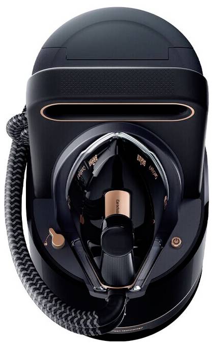 Top view of a black and copper full-face snorkel mask with hose and clear face seal.