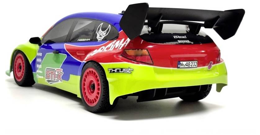 Colorful race car model shown from the rear three-quarter view, with a large black spoiler and sponsor-style decals on a white background.