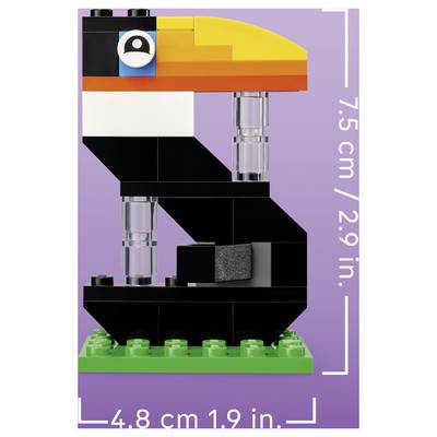 LEGO-style toucan bird model on a green base, shown with size markers 7.5 cm tall and 4.8 cm wide.