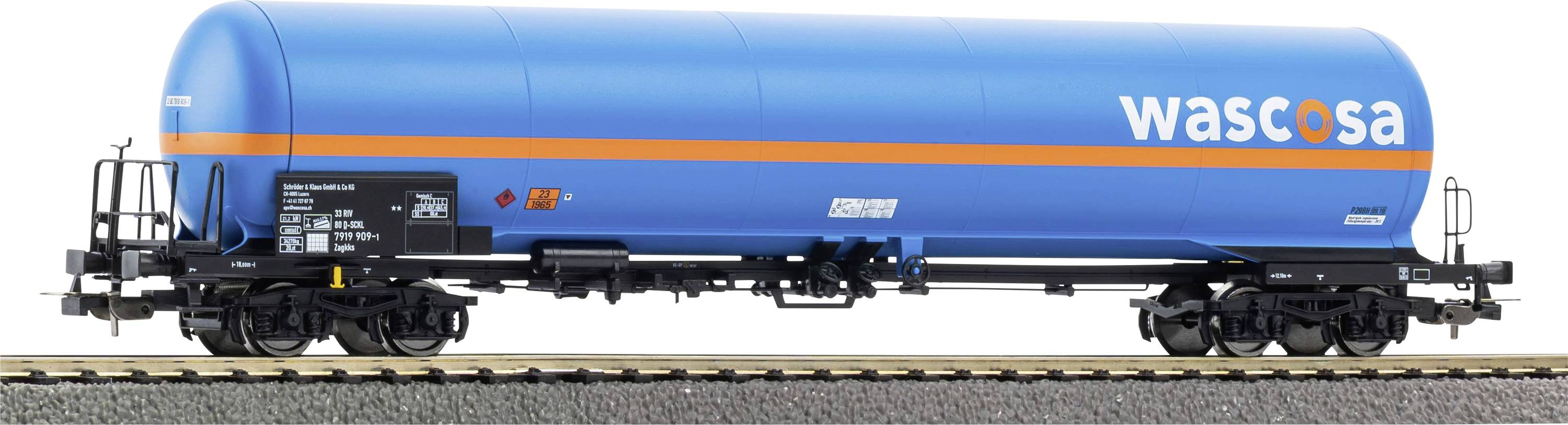 Blue WASCOSA tanker railcar viewed from the side on tracks, with ladders and black undercarriage equipment.