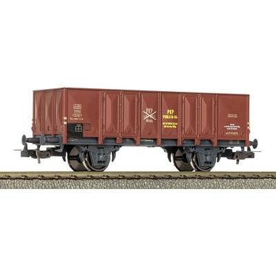 Side view of a red freight railcar on tracks, with large sliding doors and visible wheel assemblies.