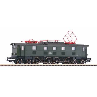 Vintage green electric locomotive shown in side view on tracks, with red pantographs on the roof.