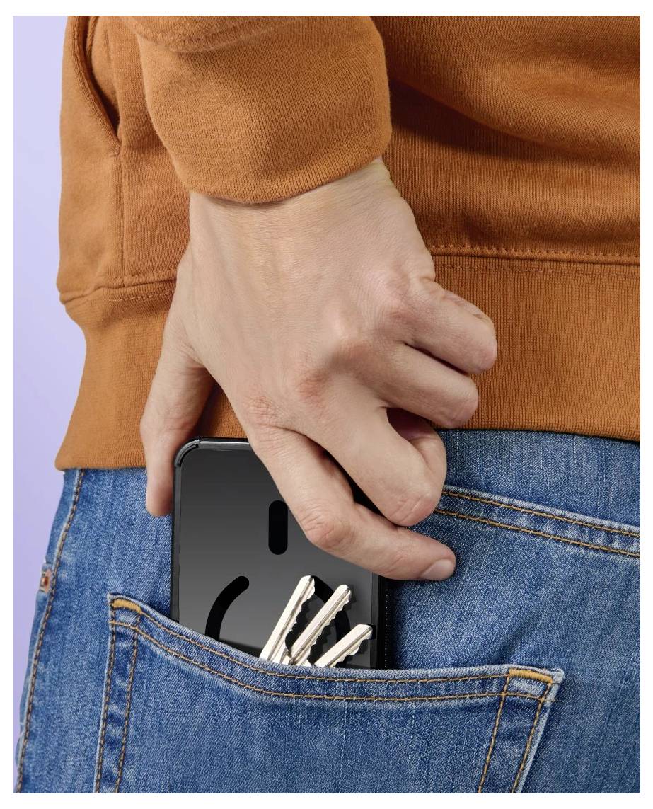 Hand reaching into back pocket of jeans to steal a smartphone with keys attached.