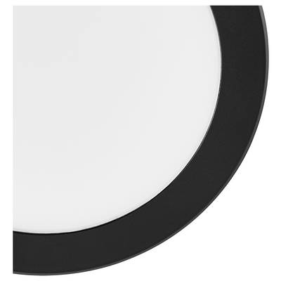 Close-up of a white circular surface with a thick black curved border, showing only part of the object against a plain background.