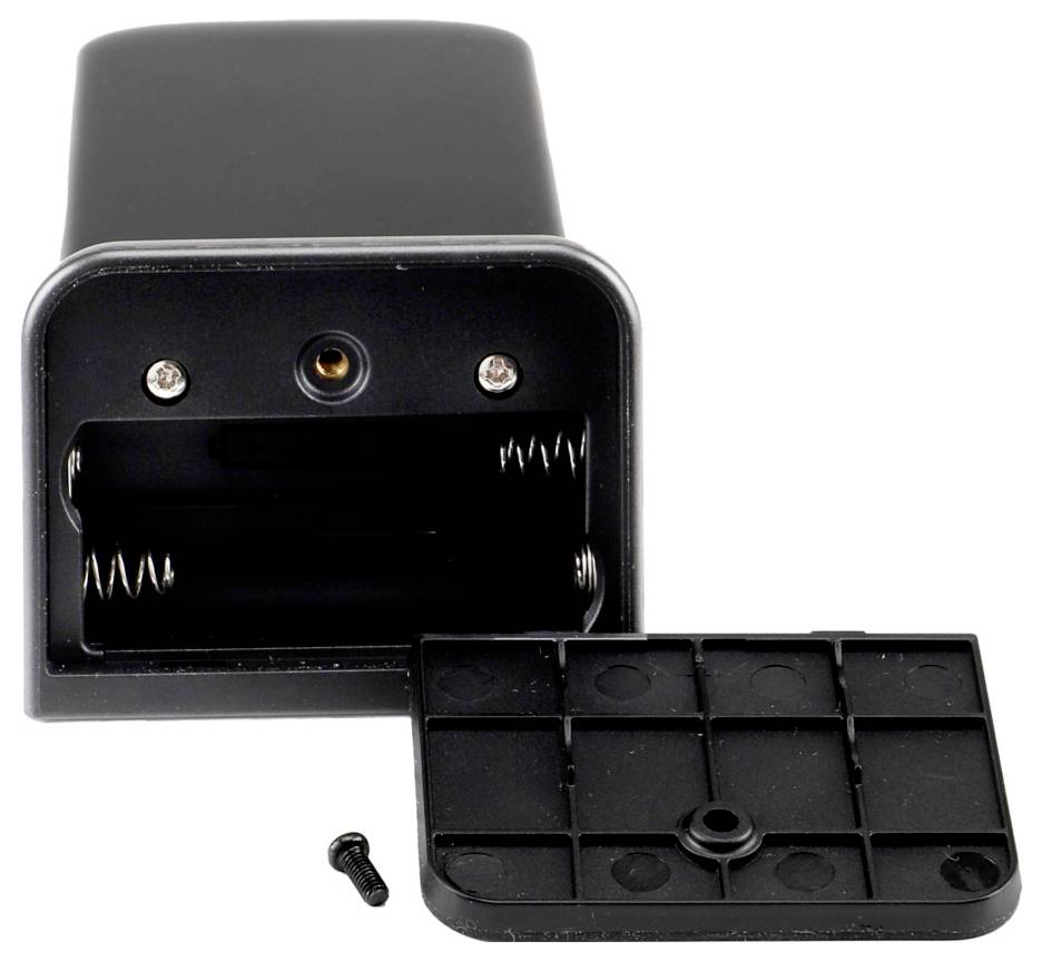 Open black battery compartment with spring contacts and a detached cover lying in front, showing the missing battery door.