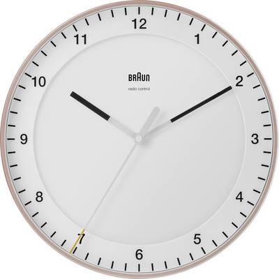 A minimalist white Braun analog wall clock with black numbers and hands, showing about 10:10.