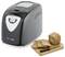 Black bread maker with digital control panel beside a cutting board holding a sliced loaf and knife<br>