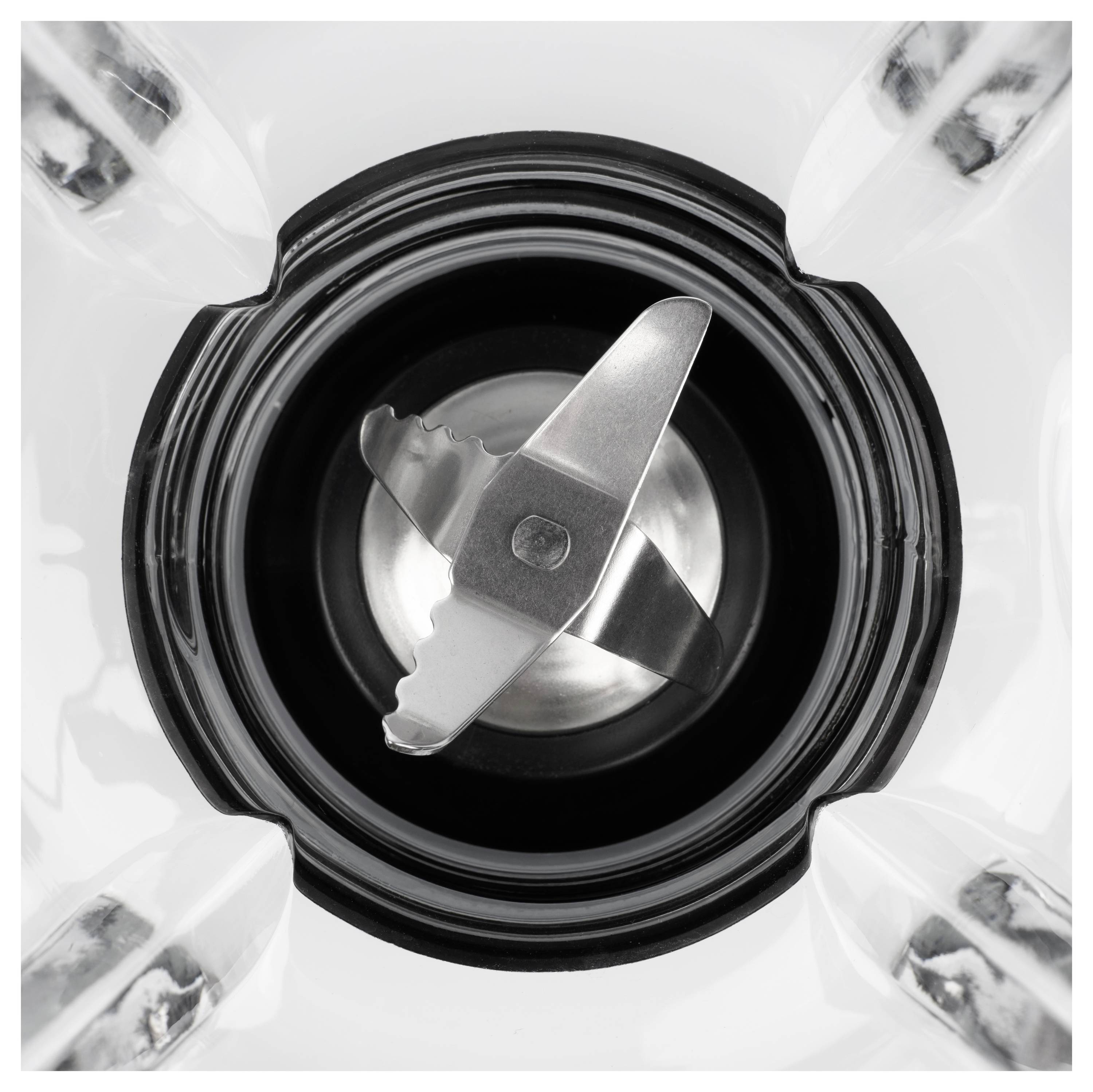 Top view of a blender or food processor jar showing the central metal blade assembly inside a black rim.