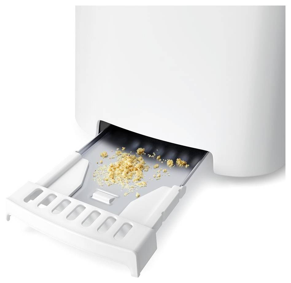 Open printer paper tray with scattered paper crumbs inside a white printer<br>