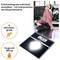 Advertising graphic featuring digital scales and woman in kitchen; states 5 activity levels individually adjustable, body value interpretation and weight capacity 180 kg.