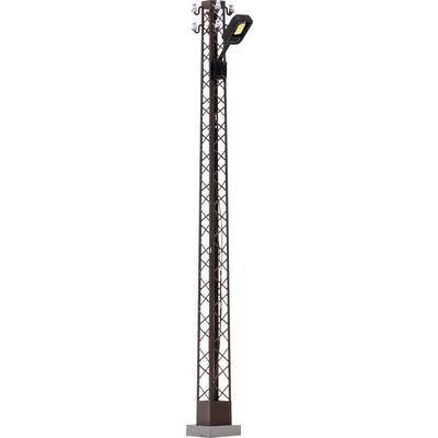 Tall brown lattice utility pole with a mounted streetlight fixture on top, shown against a white background.