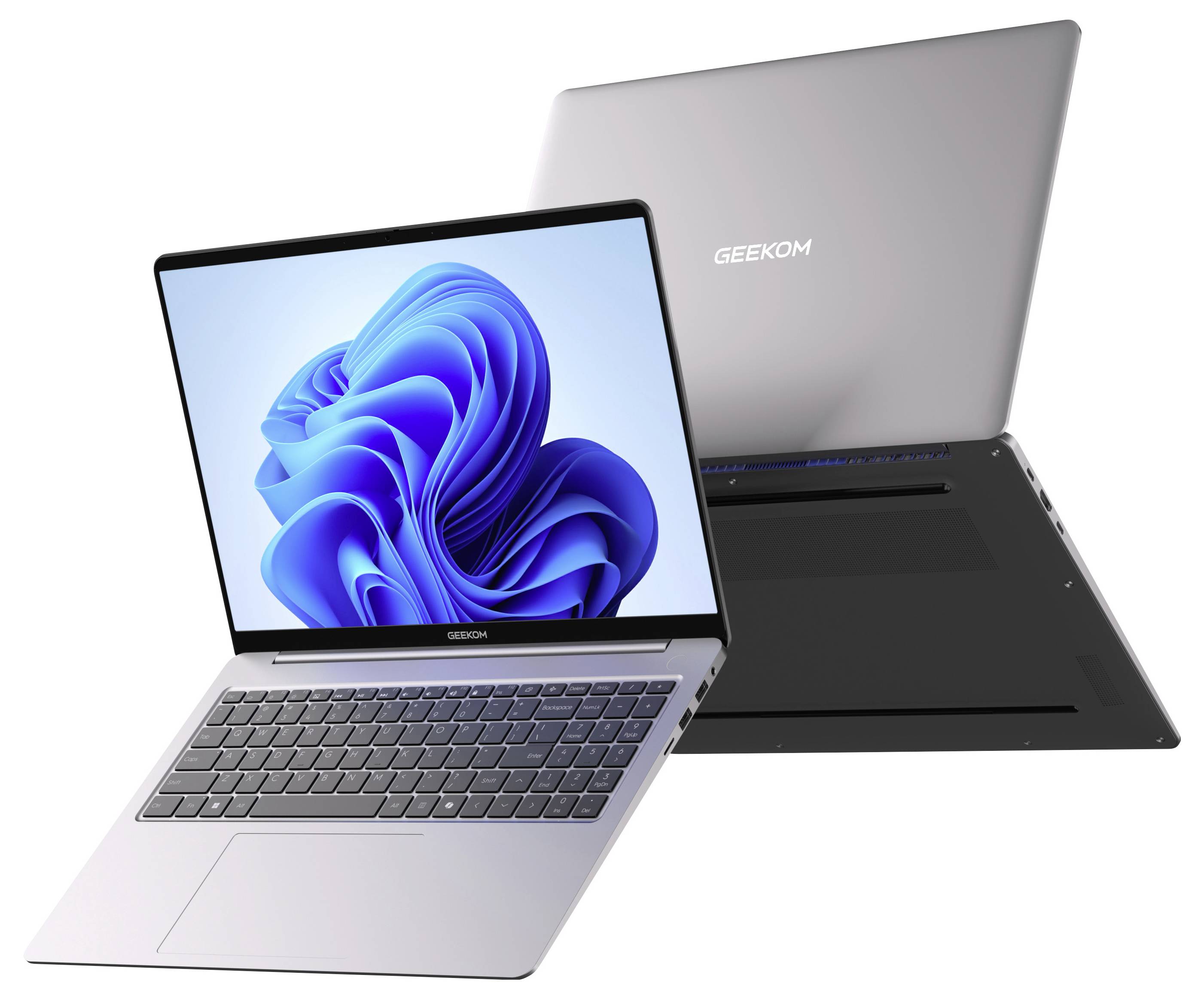 Two silver Geekom laptops shown open and closed, highlighting a Windows 11 screen and slim portable design.