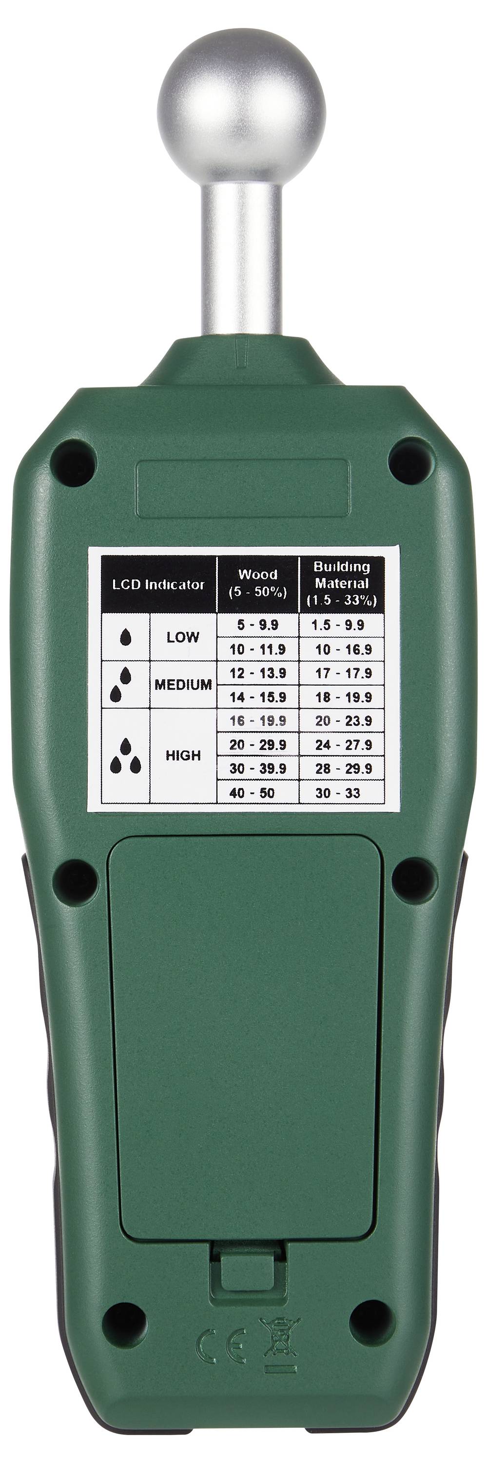Back view of a green handheld meter with a silver sensor probe and a label showing LCD and wood moisture ranges for low, medium, and high settings.