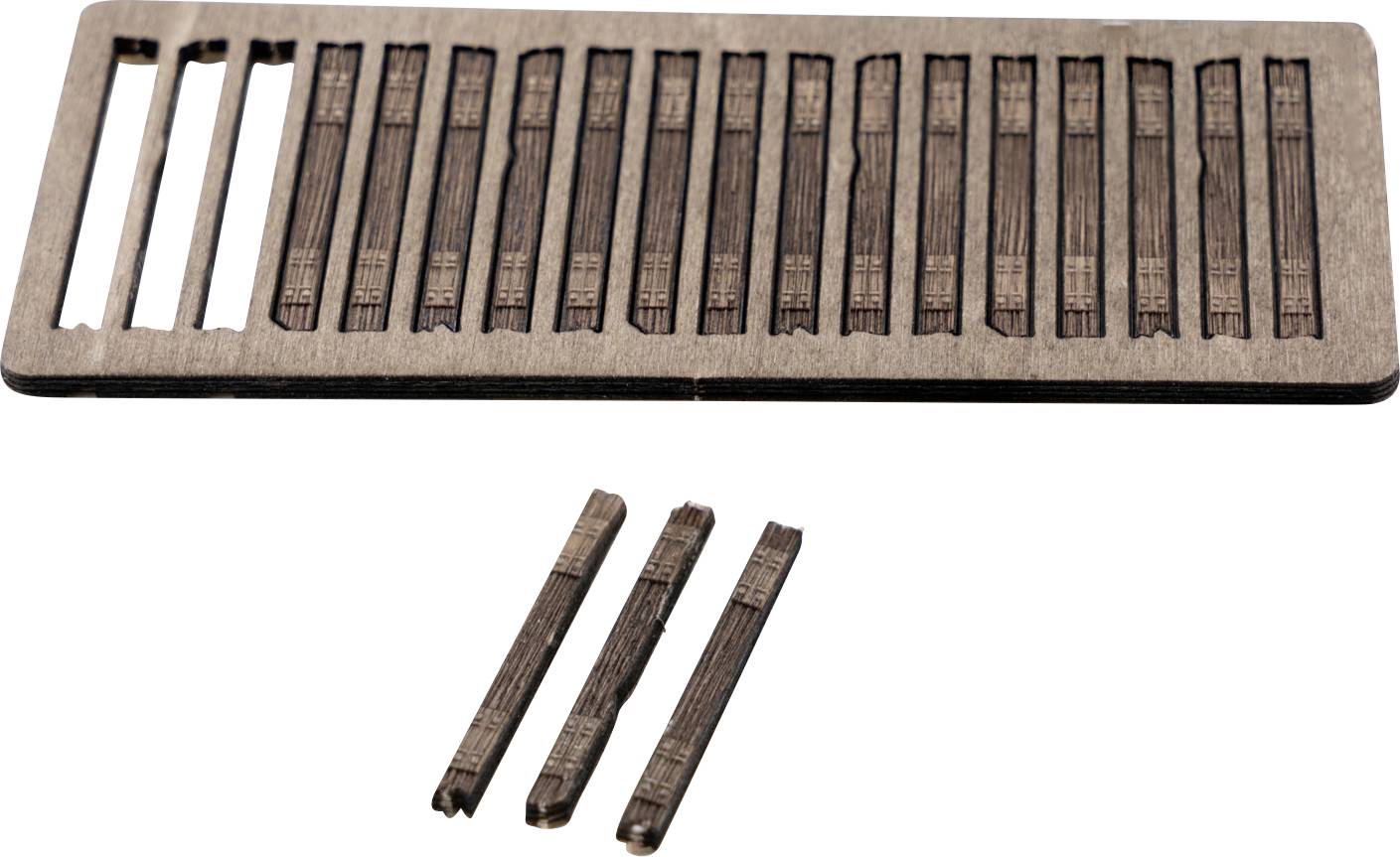 Wooden tray holding 18 narrow rectangular incense sticks, with 3 loose sticks below on a white background.