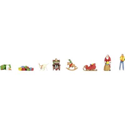 A row of Christmas-themed miniatures: wrapped presents, a dog, an armchair with a seated figure, a person on a rocking horse, a Santa sleigh, Santa beside a sack, and a worker figure.