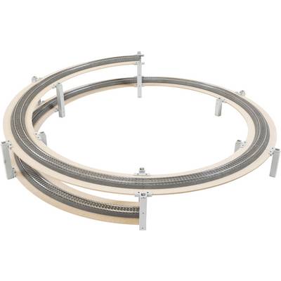 Model train track loops in a circular elevated layout with multiple supports and a crossing section<br>