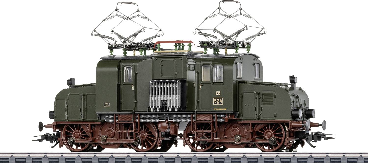 Side view of a green vintage electric locomotive on tracks, with overhead pantographs and detailed red wheels.