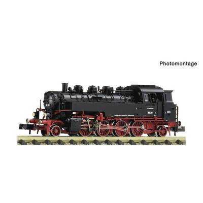 Black steam locomotive in side view, labeled 'Photomontage,' with red wheels and undercarriage on a white background.