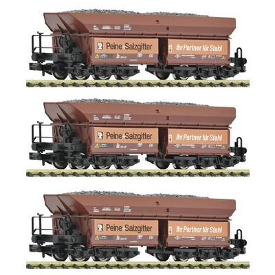 Three views of a brown Peine-Salzgitter freight railcar loaded with coal, labeled 'Ihr Partner für Stahl,' shown on white background.<br>