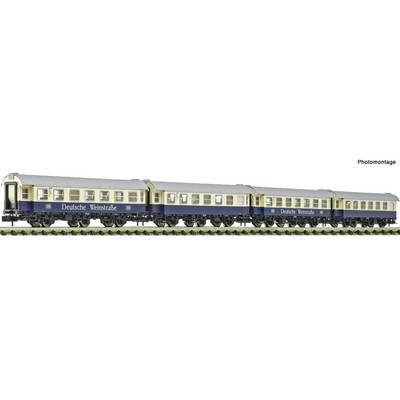 Model train passenger carriages labeled Deutsche Weinstrasse on a track, with “Photomontage” in the top right.