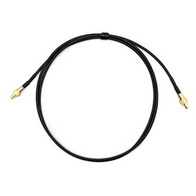 Black coaxial cable with gold connectors on both ends, coiled on a white background.