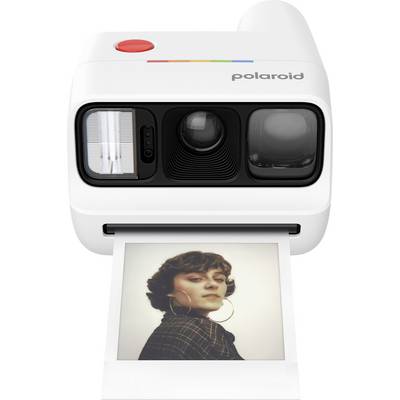White Polaroid instant camera printing a color portrait photo of a woman wearing large hoop earrings.