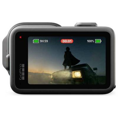 GoPro action camera displaying a silhouetted person standing on a vehicle at sunset, with recording and battery indicators on screen.