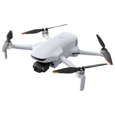A white quadcopter drone with four propellers and a front-mounted camera, shown on a plain background.