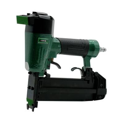Green and black pneumatic nail gun with a top magazine and trigger, shown in side view on a white background.