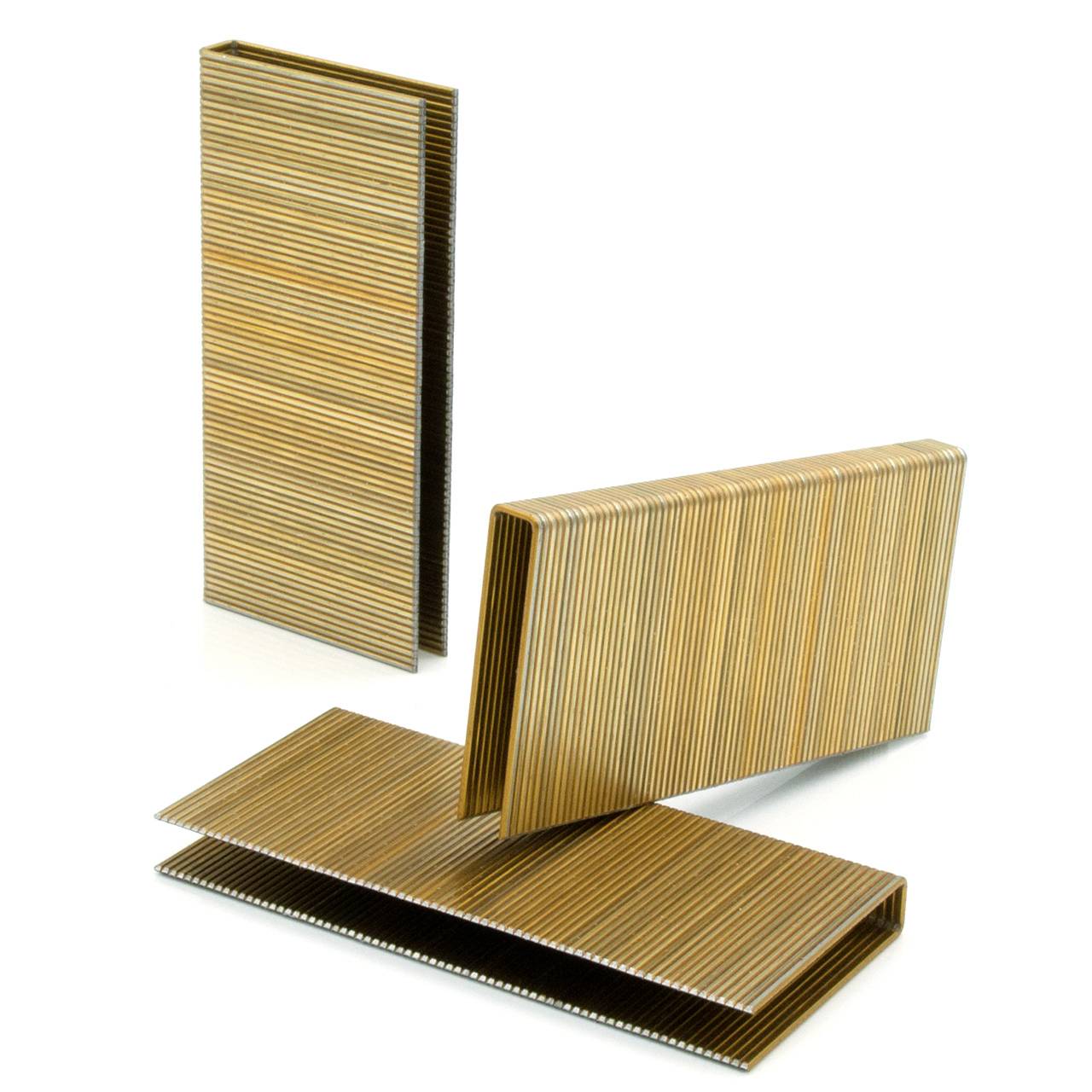 Three stacks of brown corrugated staples arranged to show staple strips, including one upright and one bent open on a white background.