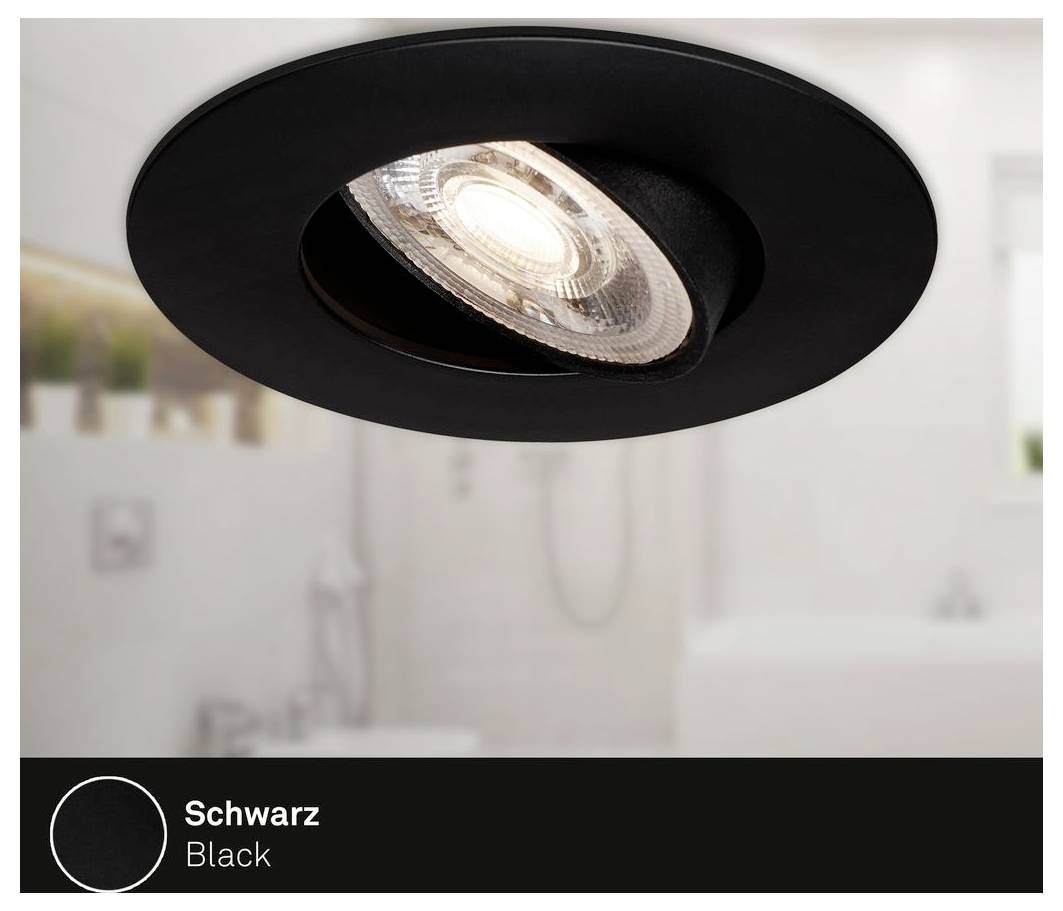Black recessed ceiling spotlight with a black finish, shown in close-up against a blurred bathroom-like background.