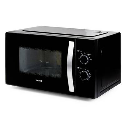 Black countertop microwave oven with front window, two control dials, and silver vertical handle on the right<br>