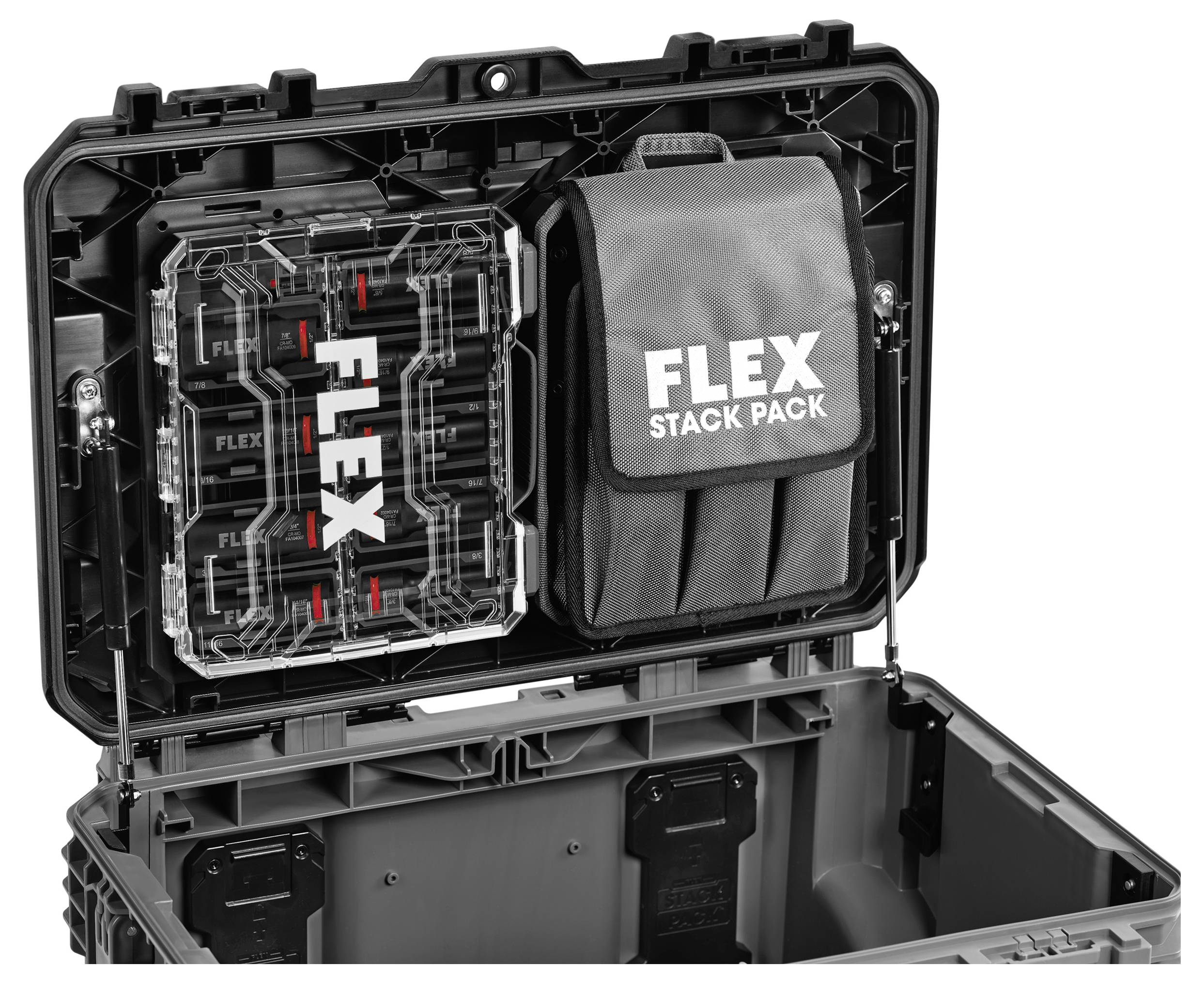 Open rugged black storage case with a Flex Stack Pack organizer attached inside the lid and plastic compartments visible in the base.