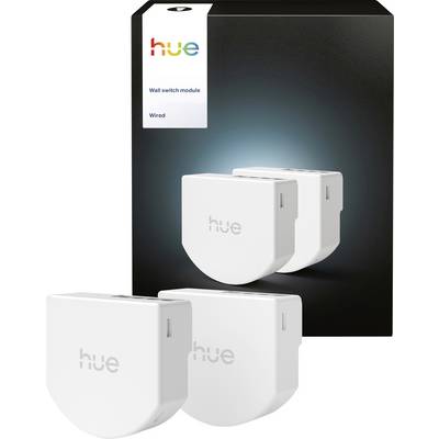 Boxed Philips Hue wired wall switch module shown with three white smart switch units in front<br>
