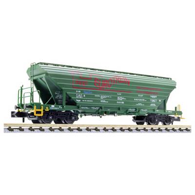 Green Eurofima freight rail hopper car model on tracks, side view with red 'Eurofima' lettering and yellow couplers on a white background