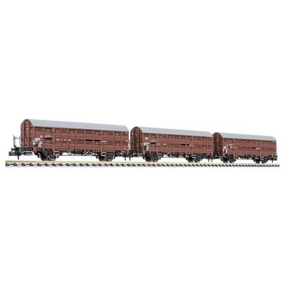 Three brown freight boxcars connected in a row, shown side view on a white background.