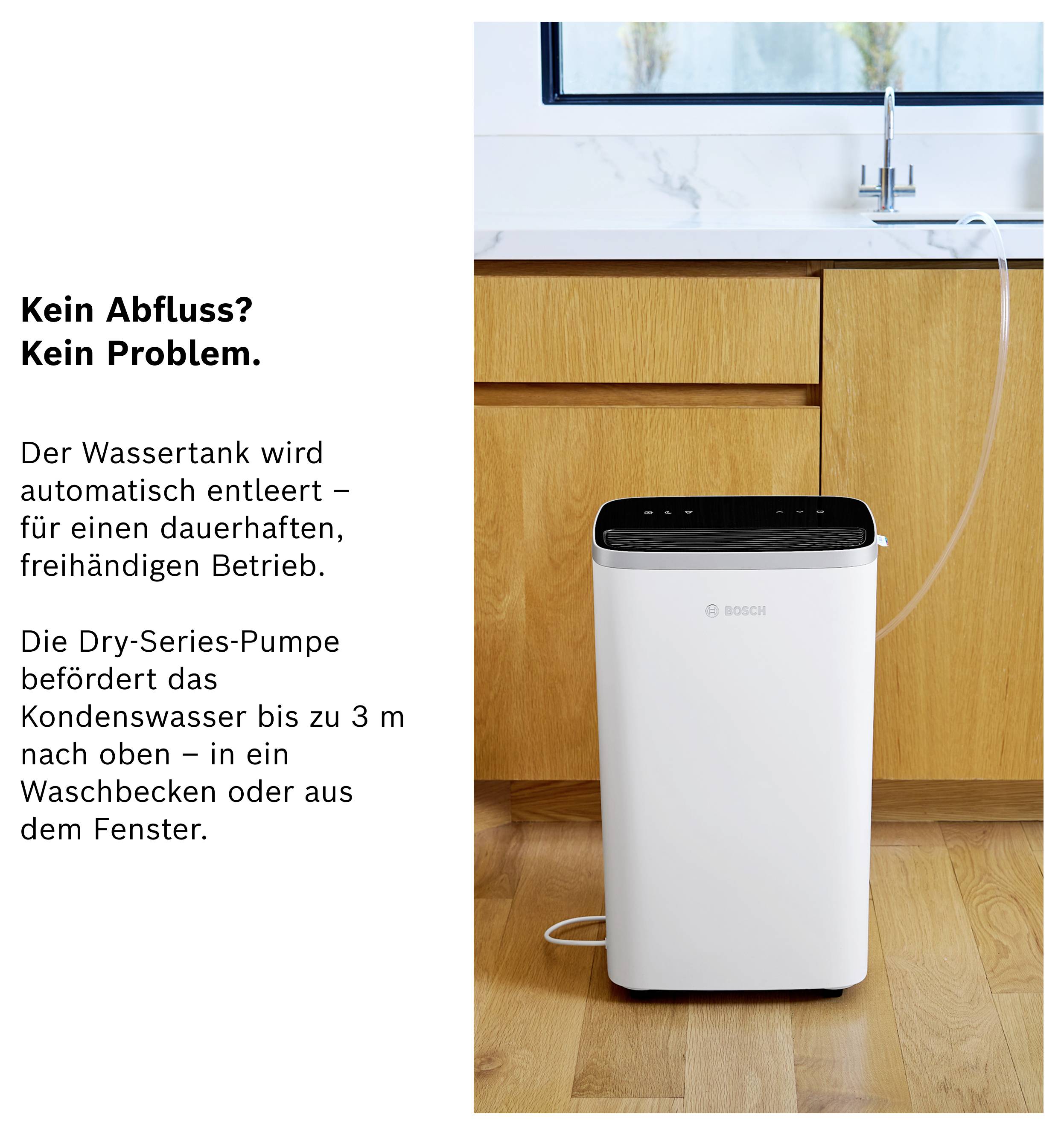 Bosch air conditioning unit in kitchen; explanation: Water tank empties automatically, the Dry-Series pump directs condensation up to 3 metres to the sink or out of the window.