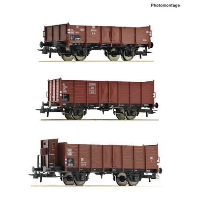Photomontage showing three side views of red freight rail wagons of different designs, each isolated on a white background.