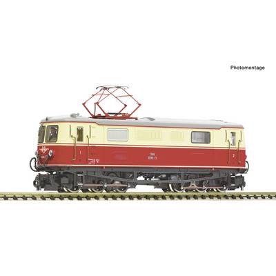 Side view of a red and cream electric locomotive with roof pantograph, shown on train tracks against a white background.
