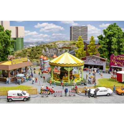 Miniature amusement park scene with a striped carousel at center, small crowds, food stands, a 'shoot' game booth, and parked cars in the foreground.